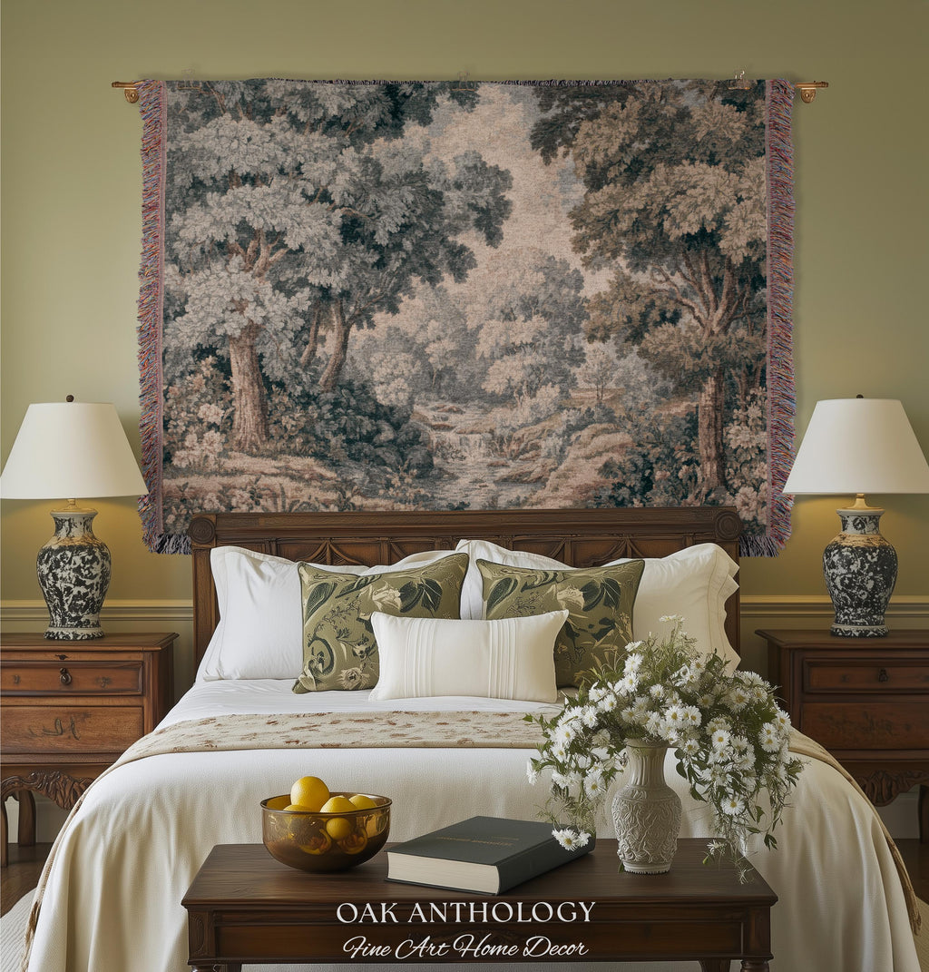 May include: A rectangular woven wall tapestry featuring a detailed landscape scene of a dense forest with tall trees and a small stream. The tapestry has a fringed edge and is displayed above a bed with pillows, lamps, and a wooden bench.